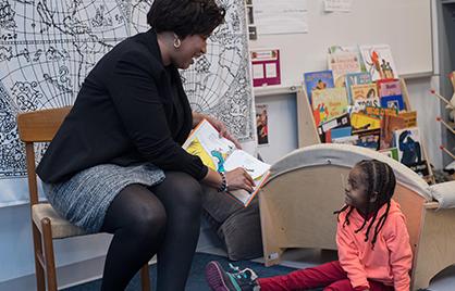 Mayor Bowser and little girl